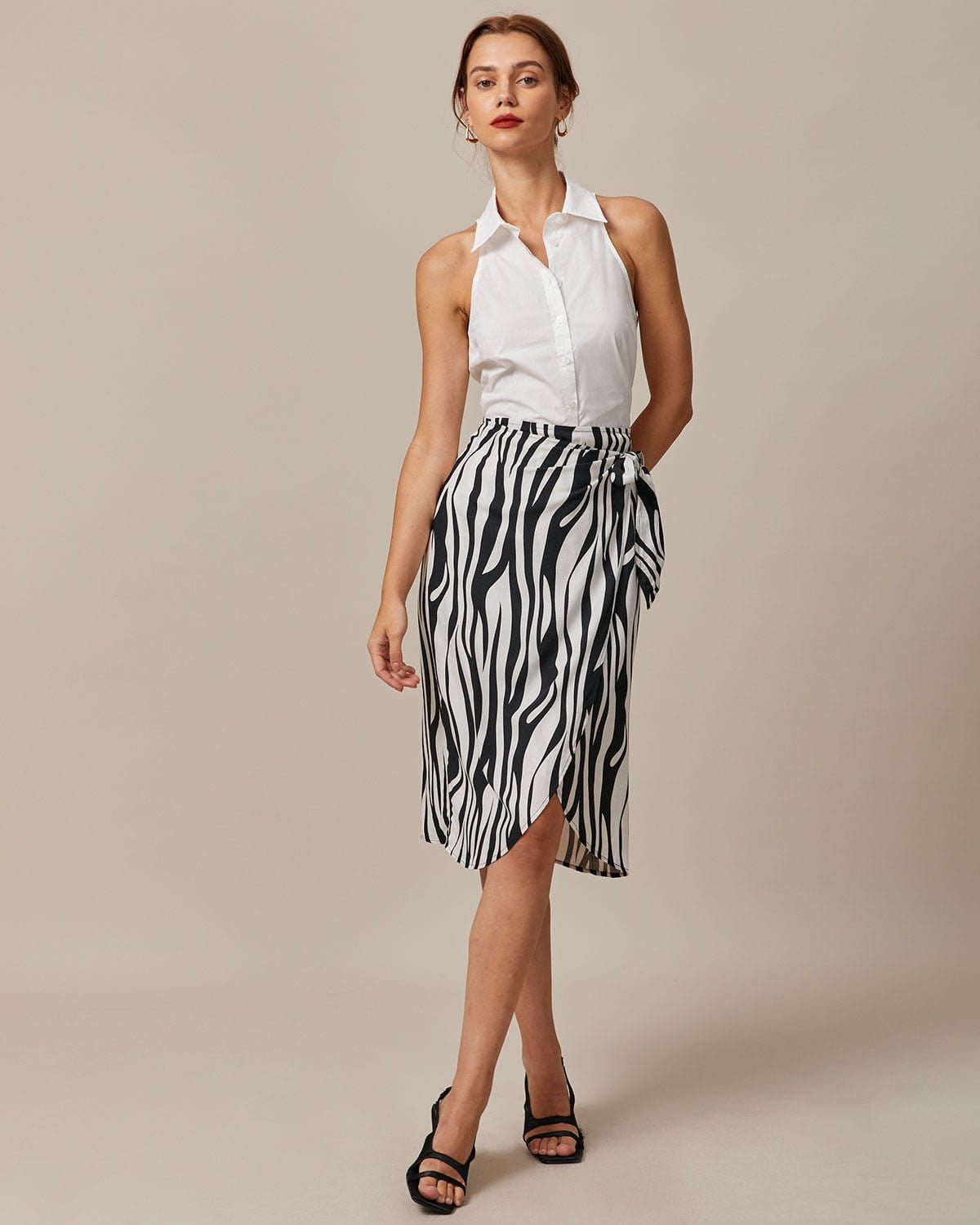 Ella Paris™ | La chemise blanche sans manches à col et à boutons